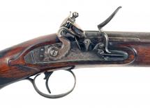 A 16-Bore Flintlock Sporting Gun by Muntz. 