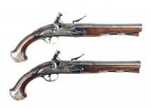 A Superb Pair of Irish Silver Mounted Pistols