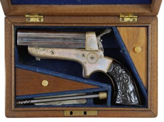 A Cased Four Barrel Pistol by E. M. Reilly 