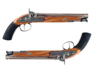 A Cased Pair Of Officers Pistols