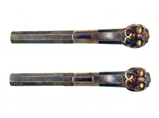 A Pair of Blue and Gilt Percussion Pistols