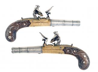 A Pair of Silver Inlaid Pocket Pistols