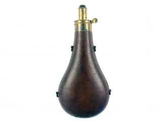 A Large Leather Covered Powder Flask