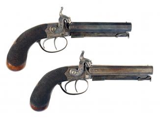 An Unused Pair of Cased Double Barrel Pistols