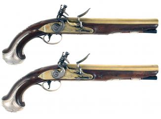 A Pair of Silver Mounted Flintlock Pistols