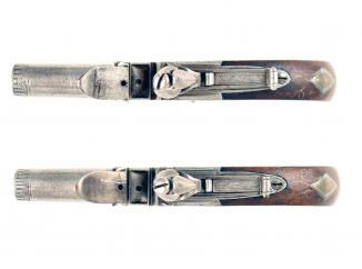 A Superb Pair of Silver Inlaid Pocket Pistols