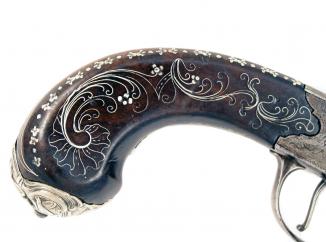 A Silver Inlaid Tap Action Pistol