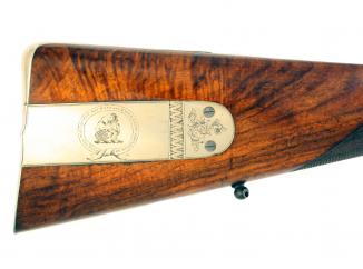 A Cased Presentation Rifle by Mortimer