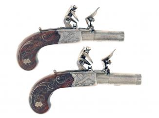 A Superb Pair of Silver Inlaid Pocket Pistols
