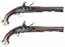 A Pair of Silver Mounted Pistols by Dalton of Dublin