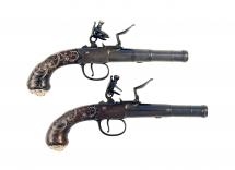 A Good Pair of Silver Mounted Pocket Pistols