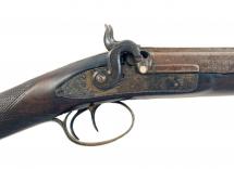 A D.B. Percussion Sporting Gun by C. Moore. 