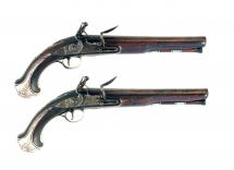 A Pair of Silver Mounted Holster Pistols by Griffin