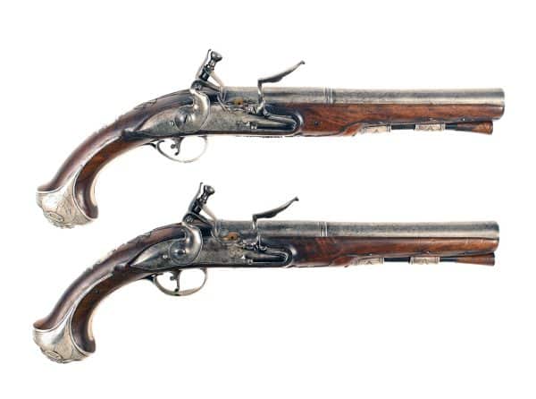 A Superb Pair of Irish Silver Mounted Pistols