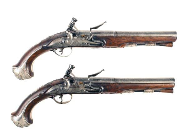 A Superb Pair of Irish Silver Mounted Pistols