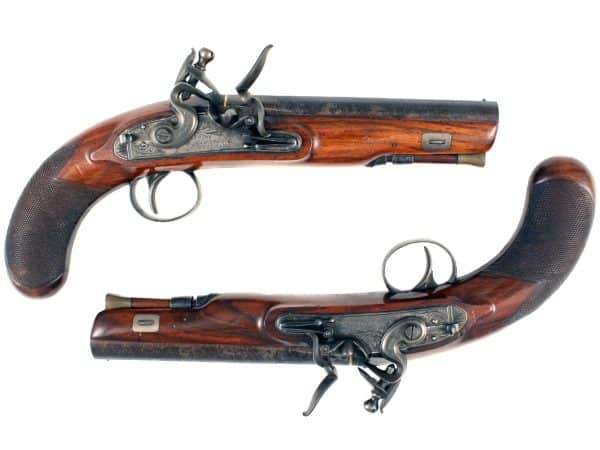 A Pair Of Flintlock Overcoat Pistols
