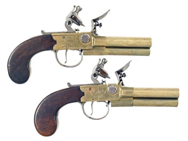 A Rare Pair of 3 Barrel Pistols