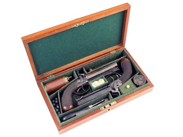 An Unused Pair of Cased Double Barrel Pistols
