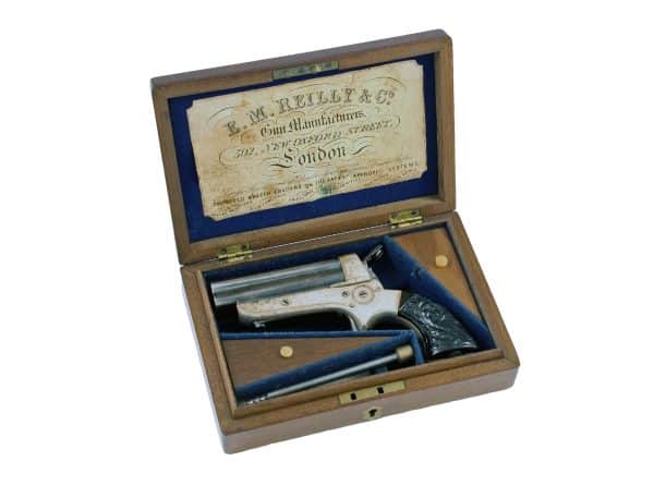 A Cased Four Barrel Pistol by E. M. Reilly