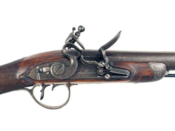 A Flintlock Blunderbuss by Henshaw of London.