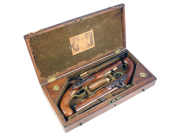 A Cased Pair of Pistols by H.W. Mortimer