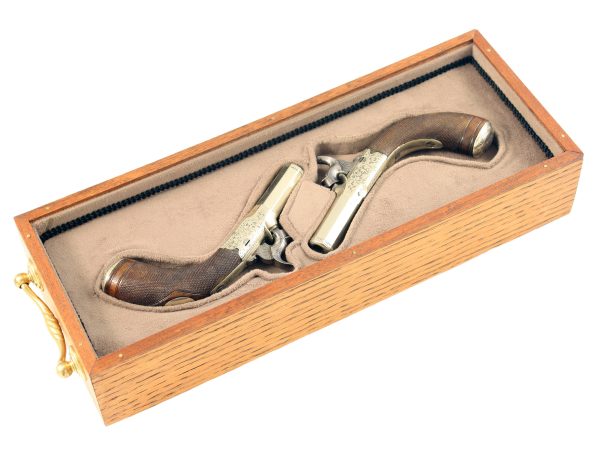 A Pair of Percussion Muff Pistols