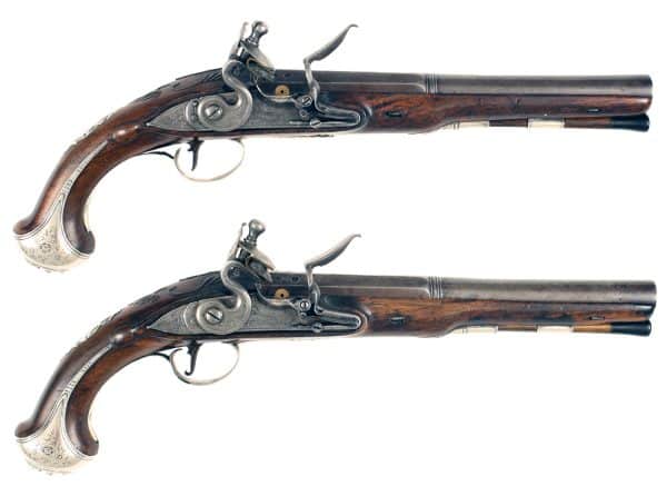 A Pair of Silver Mounted Pistols by Dalton of Dublin
