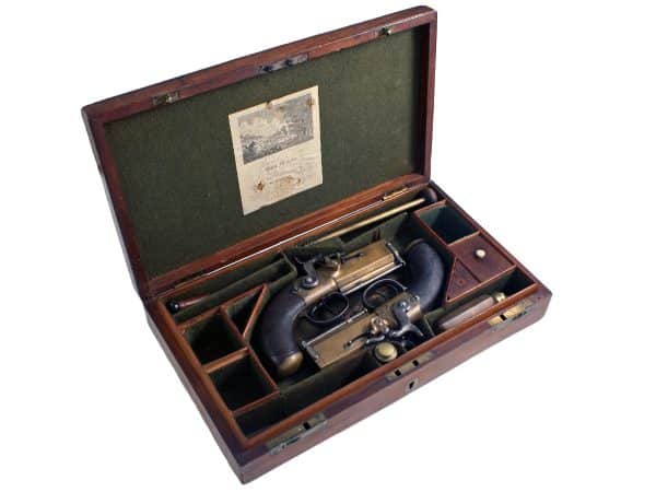 A Cased Pair of Over & Under Pistols