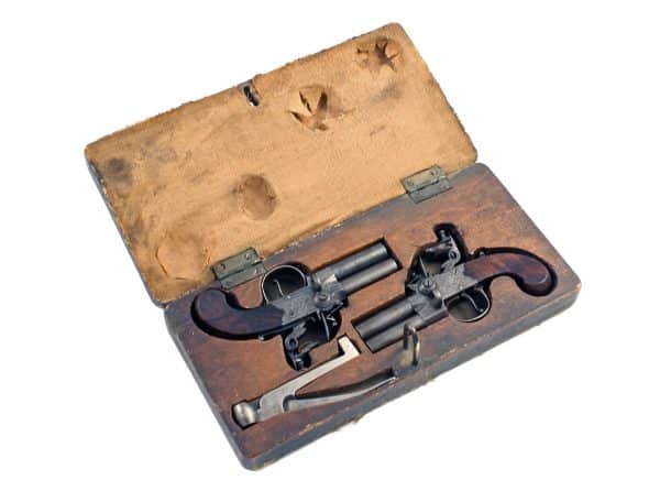 A Crisp Pair of Cased Tap Action Pistols