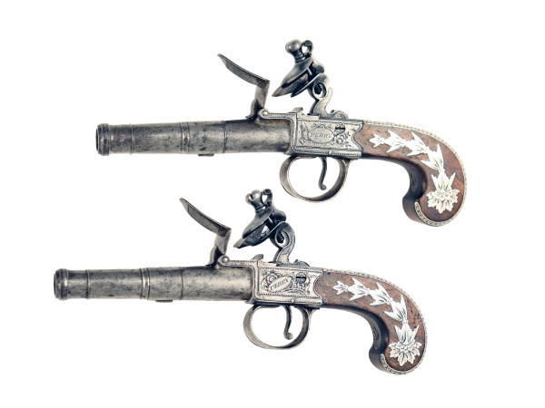 A Pair of Silver Mounted Pocket Pistols by Perry.