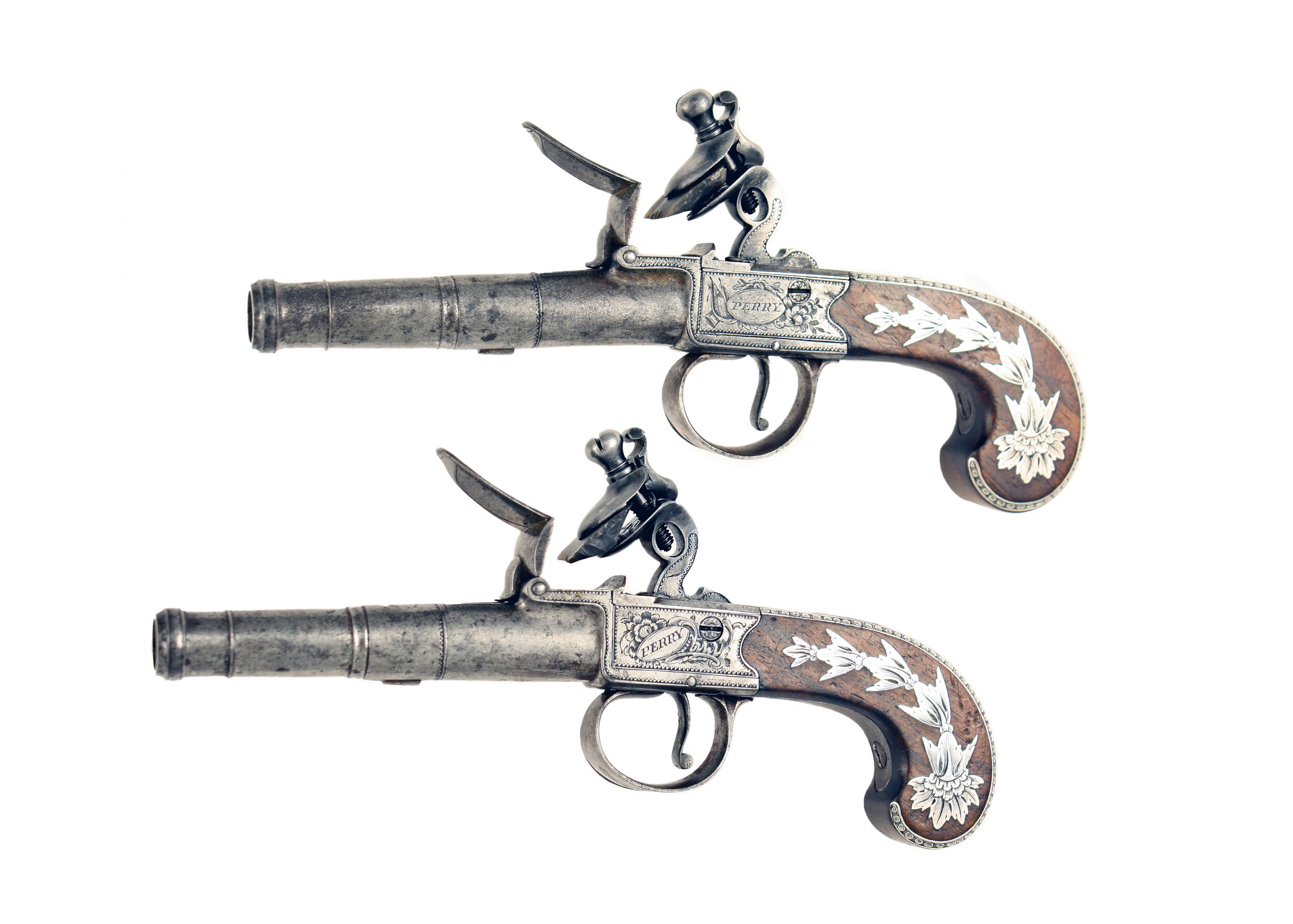 A Pair of Silver Mounted Pocket Pistols by Perry.