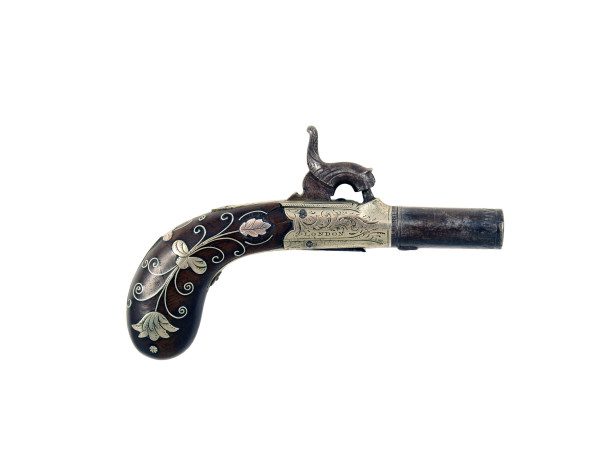 A Small Percussion Pistol by Reilly of London.