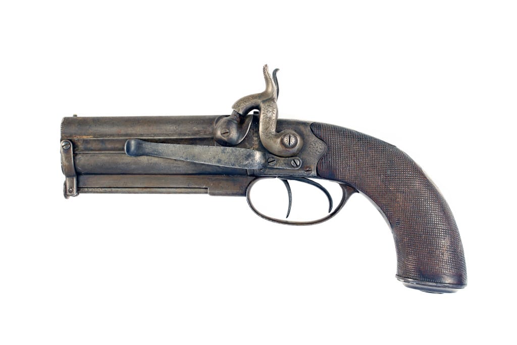 A Percussion Over & Under Pistol.