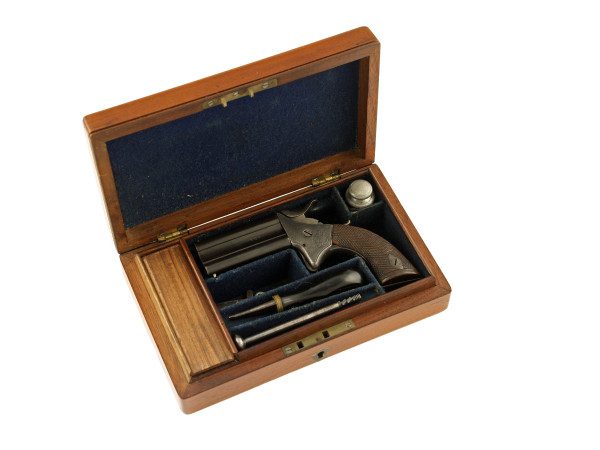 A Cased Woodward Patent Pistol, No. 567.