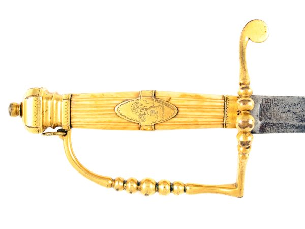 An E.I.C. Five-Ball Spadroon Hilted Sword.
