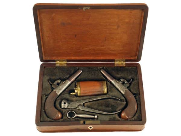 A Cased Pair of Small Percussion Pistols