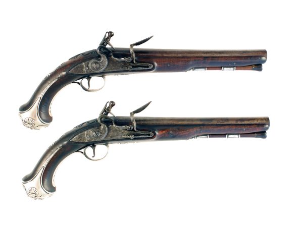 A Pair of Silver Mounted Holster Pistols by Griffin