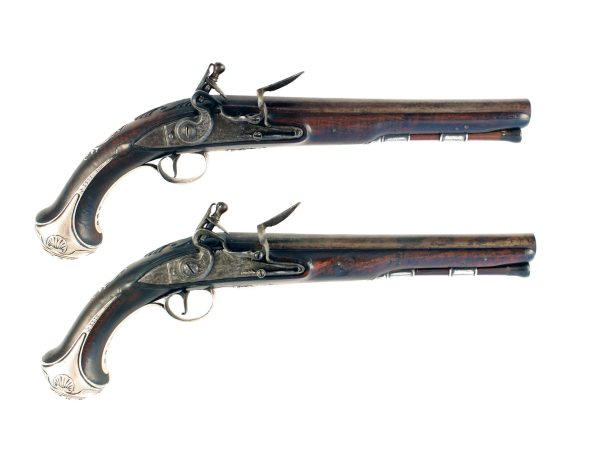 A Pair of Silver Mounted Holster Pistols by Griffin