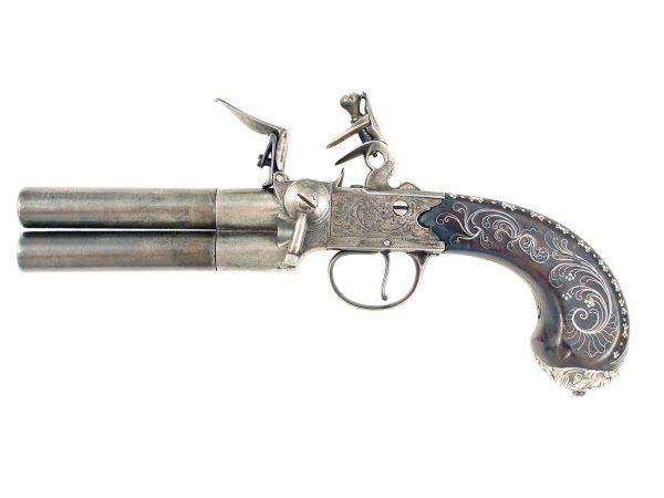 A Silver Inlaid Tap Action Pistol.