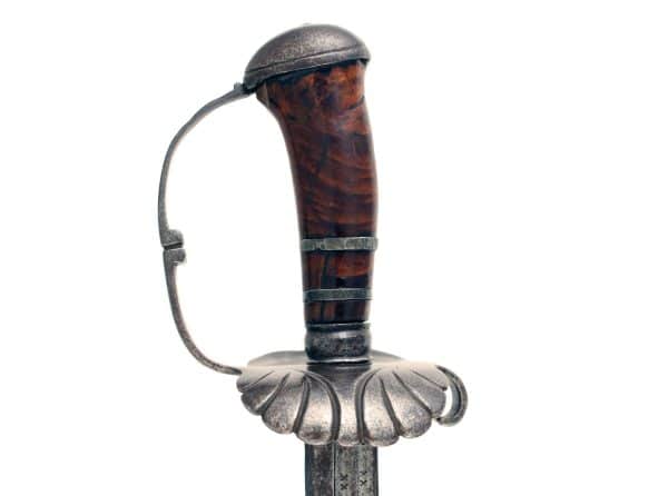 A Superb Pistol-Grip Hanger, circa 1630