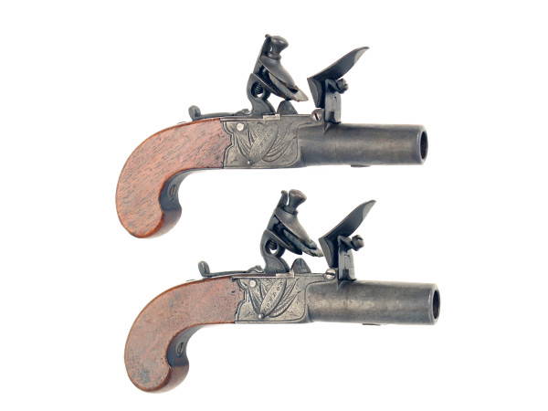 A Pair of Flintlock Pocket Pistols by S. Davis, London.