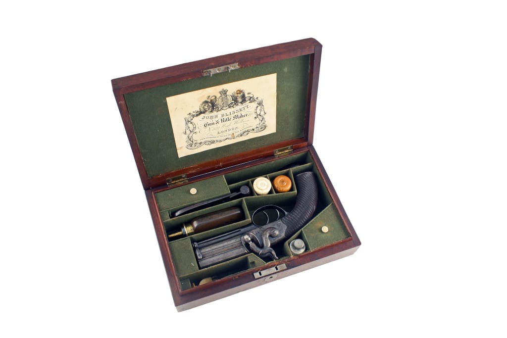 A Superb Cased Over and Under Pistol by Blissett of London.