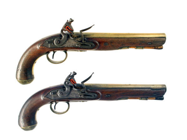 An Incredibly Rare Pair of Mail Coach Pistols by H.W. Mortimer No. 287.