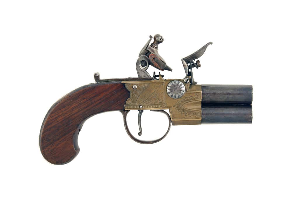 A Bronze Framed Tap Action Pistol by Barnes of Andover.