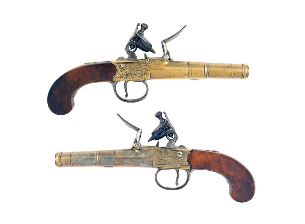 A Crisp Pair of Brass Cannon Barrelled Pistols by Rimes of London.