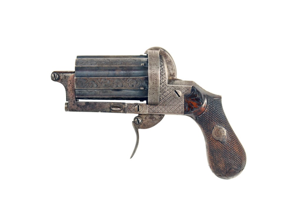 An Engraved Pin-Fire Pepperbox Revolver.