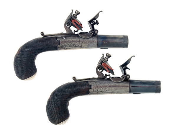 A Pair of Flintlock Round Framed Pistols