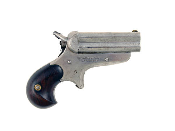 A Sharps Model 4 Barrel Derringer.