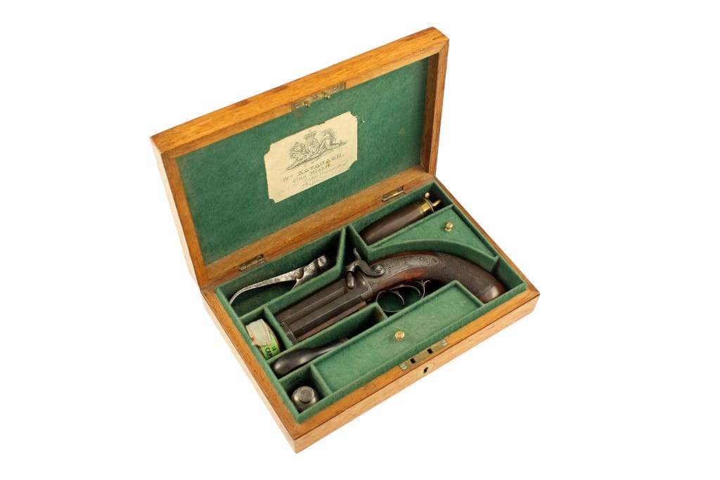 A Cased Irish Over & Pistol by Kavanagh of Dublin.