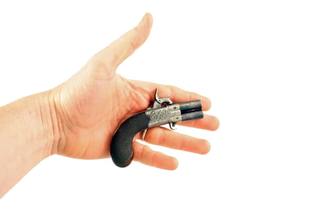 A Tiny Percussion Turn-Over Pistol.